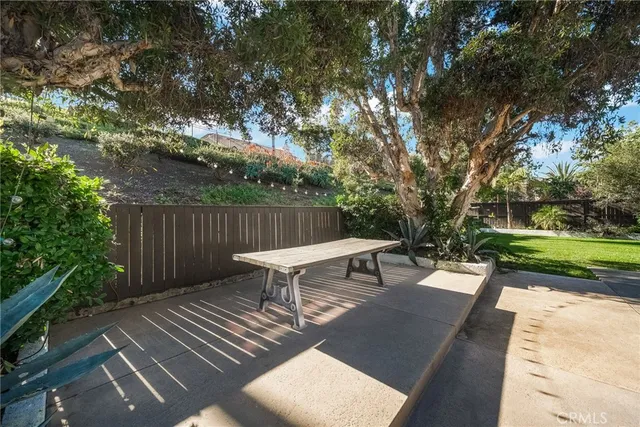 a view of a house with a yard porch and sitting area