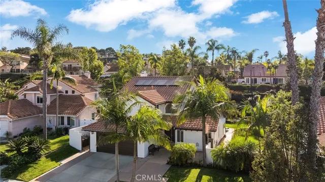 a front view of a house with yard