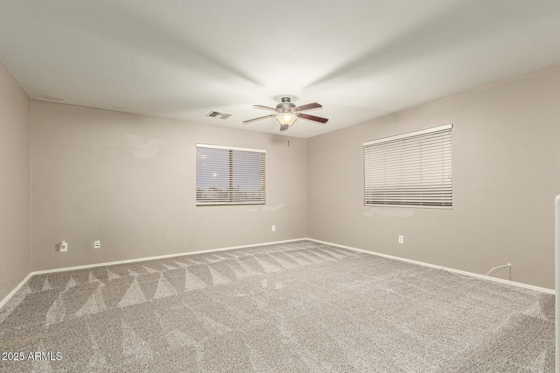 161 South 21st Street Coolidge, AZ 85128 - Photo 12 of 32 a view of an empty room with a window
