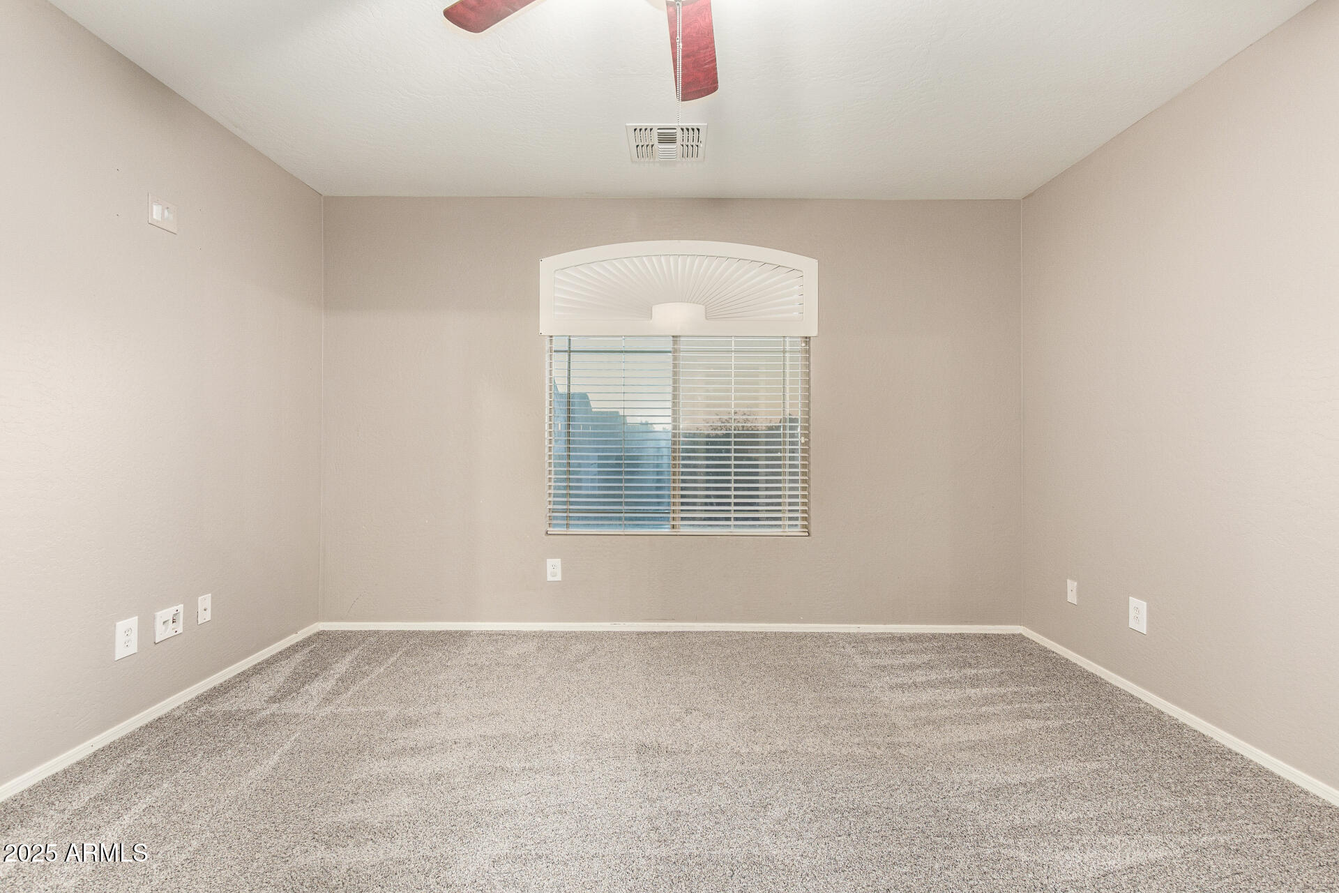 161 South 21st Street Coolidge, AZ 85128 - Photo 15 of 32 an empty room with a window