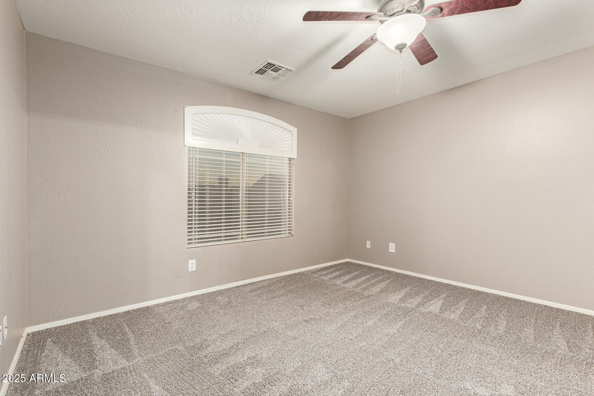 161 South 21st Street Coolidge, AZ 85128 - Photo 20 of 32 a view of an empty room with a window