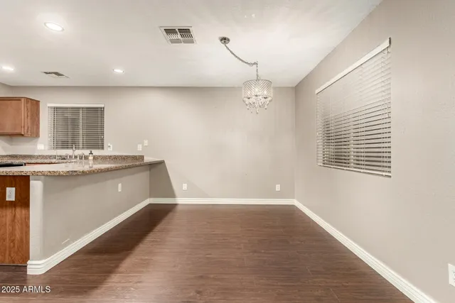 a bathroom with a sink a vanity and a mirror