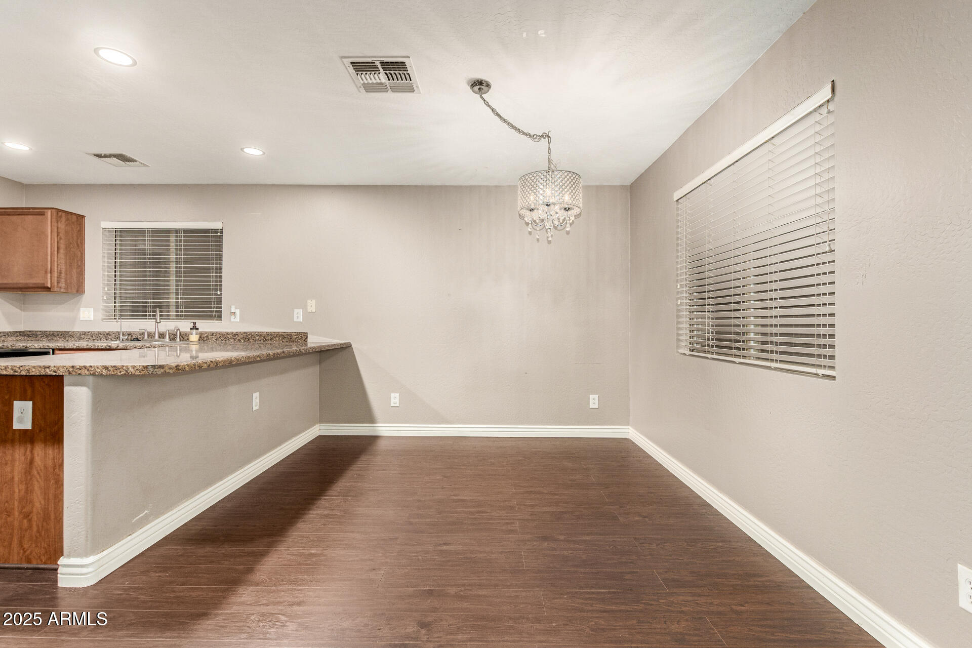 161 South 21st Street Coolidge, AZ 85128 - Photo 6 of 32 a bathroom with a sink a vanity and a mirror
