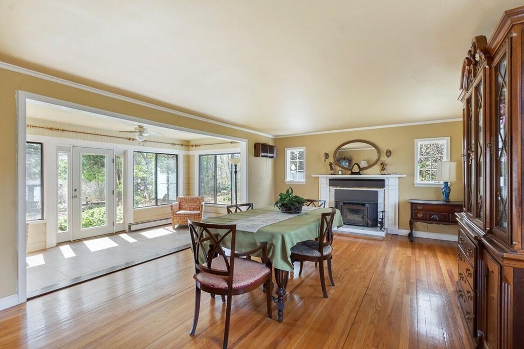 204 Sterling Road Lancaster, MA 01523 - Photo 13 of 41 a view of a dining room with furniture window and wooden floor