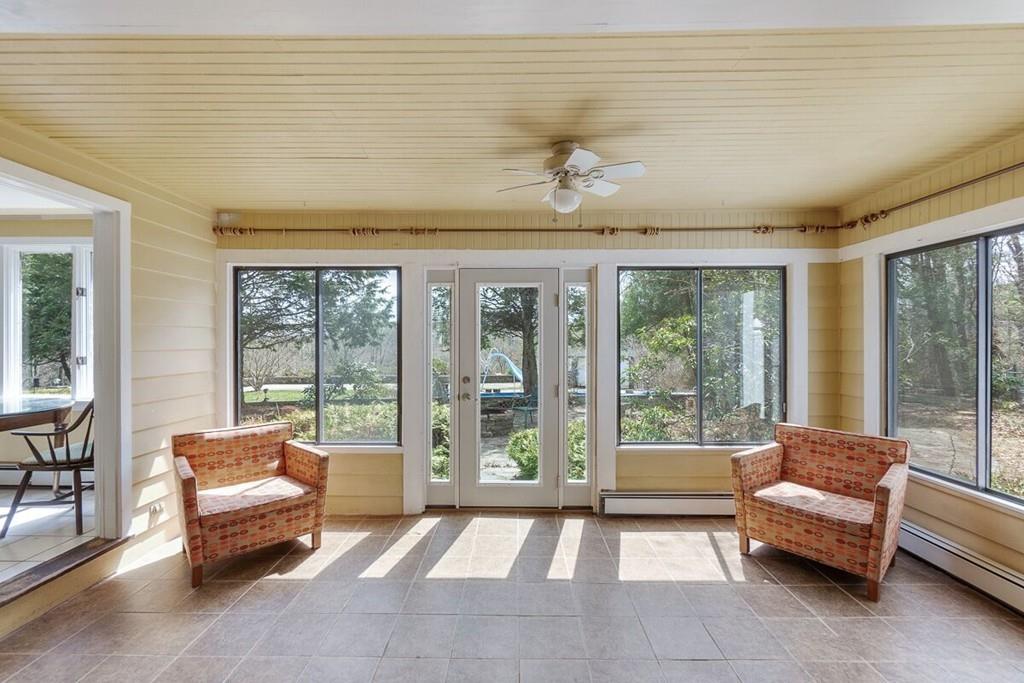 204 Sterling Road Lancaster, MA 01523 - Photo 15 of 41 a living room with furniture and large windows