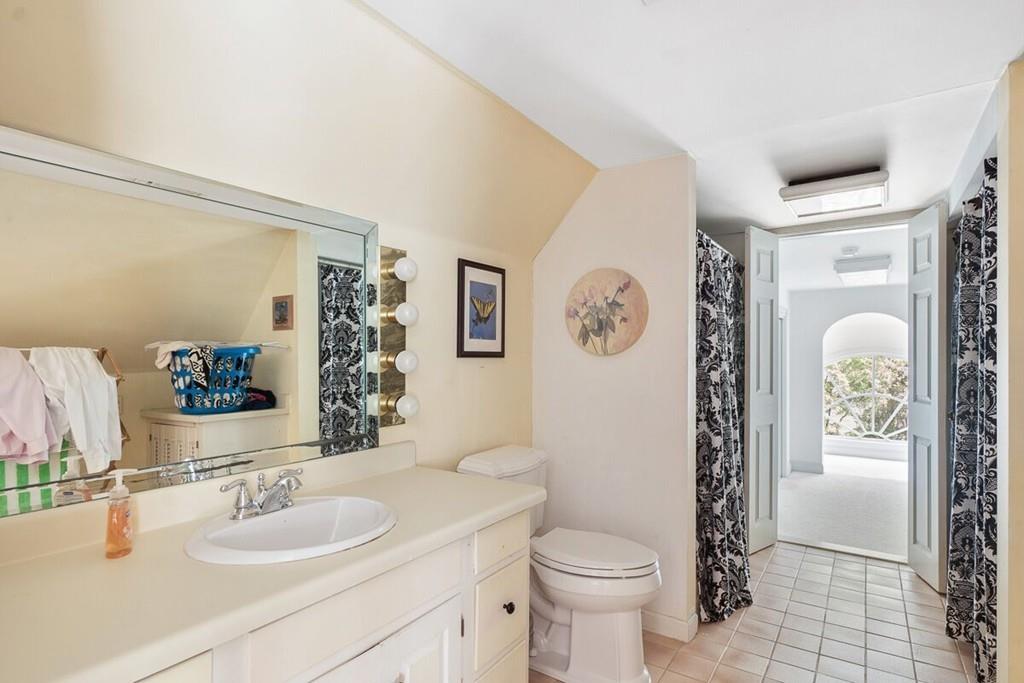 204 Sterling Road Lancaster, MA 01523 - Photo 36 of 41 a bathroom with a sink toilet and shower