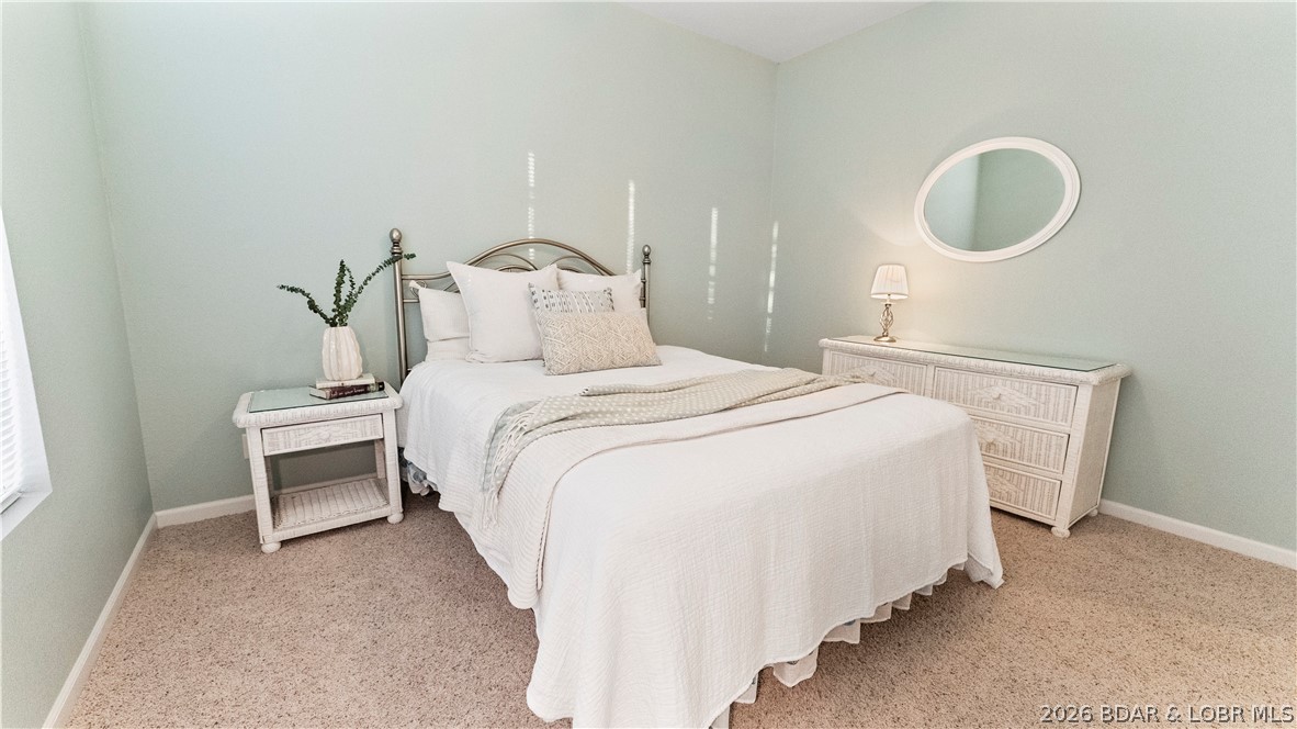 1181 Jeffries Road, Unit B307 Osage Beach, MO 65065 - Photo 5 of 44 Guest Bedroom