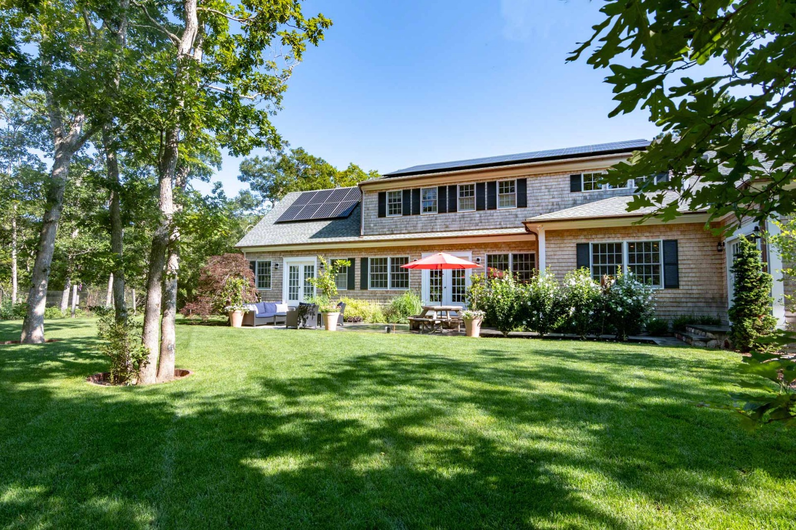 14 North Bog Road Edgartown, MA 02539 - Photo 2 of 46 a front view of house with yard and green space