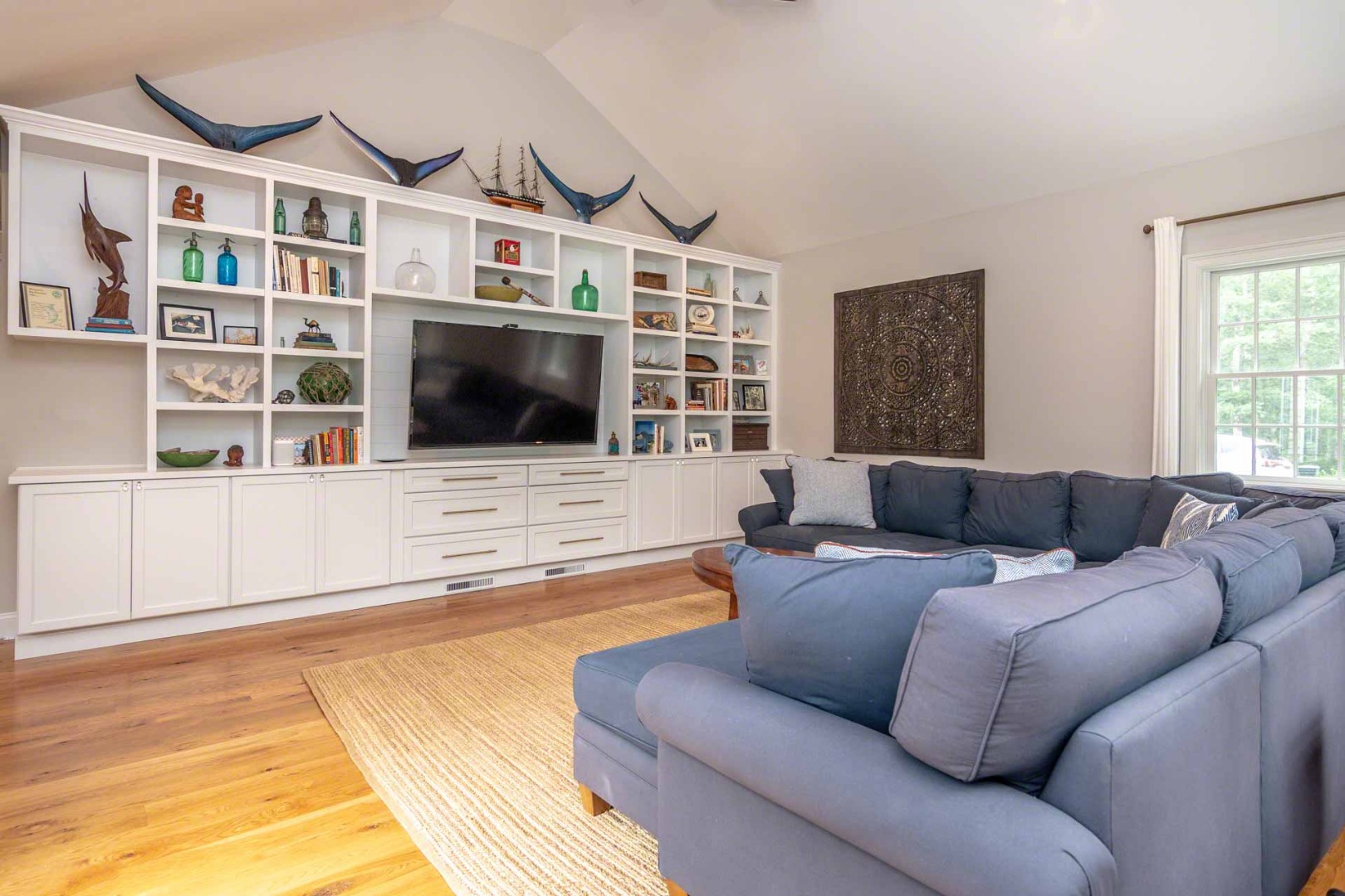 14 North Bog Road Edgartown, MA 02539 - Photo 19 of 46 a living room with furniture and a flat screen tv