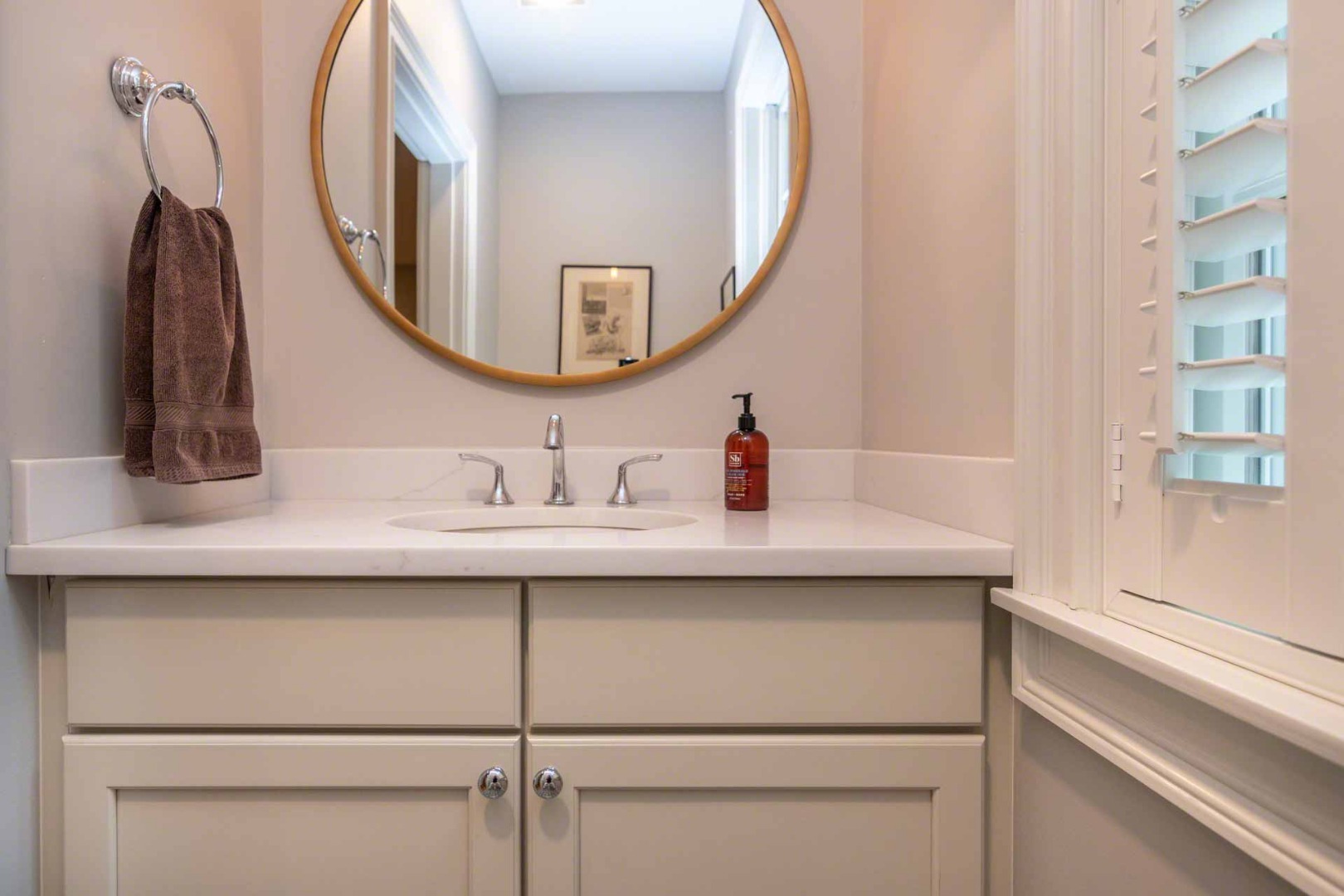 14 North Bog Road Edgartown, MA 02539 - Photo 22 of 46 a bathroom with a sink and a mirror