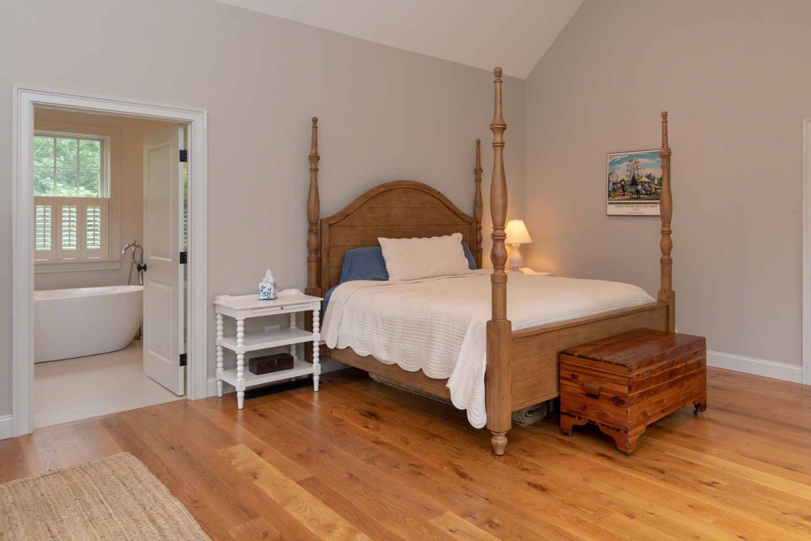 14 North Bog Road Edgartown, MA 02539 - Photo 23 of 46 a bedroom with a bed and a chair