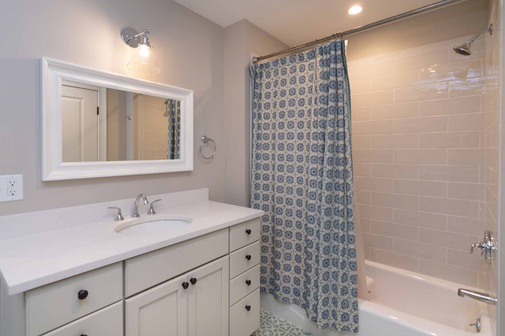 14 North Bog Road Edgartown, MA 02539 - Photo 37 of 46 a bathroom with a sink a mirror a vanity and a bathtub