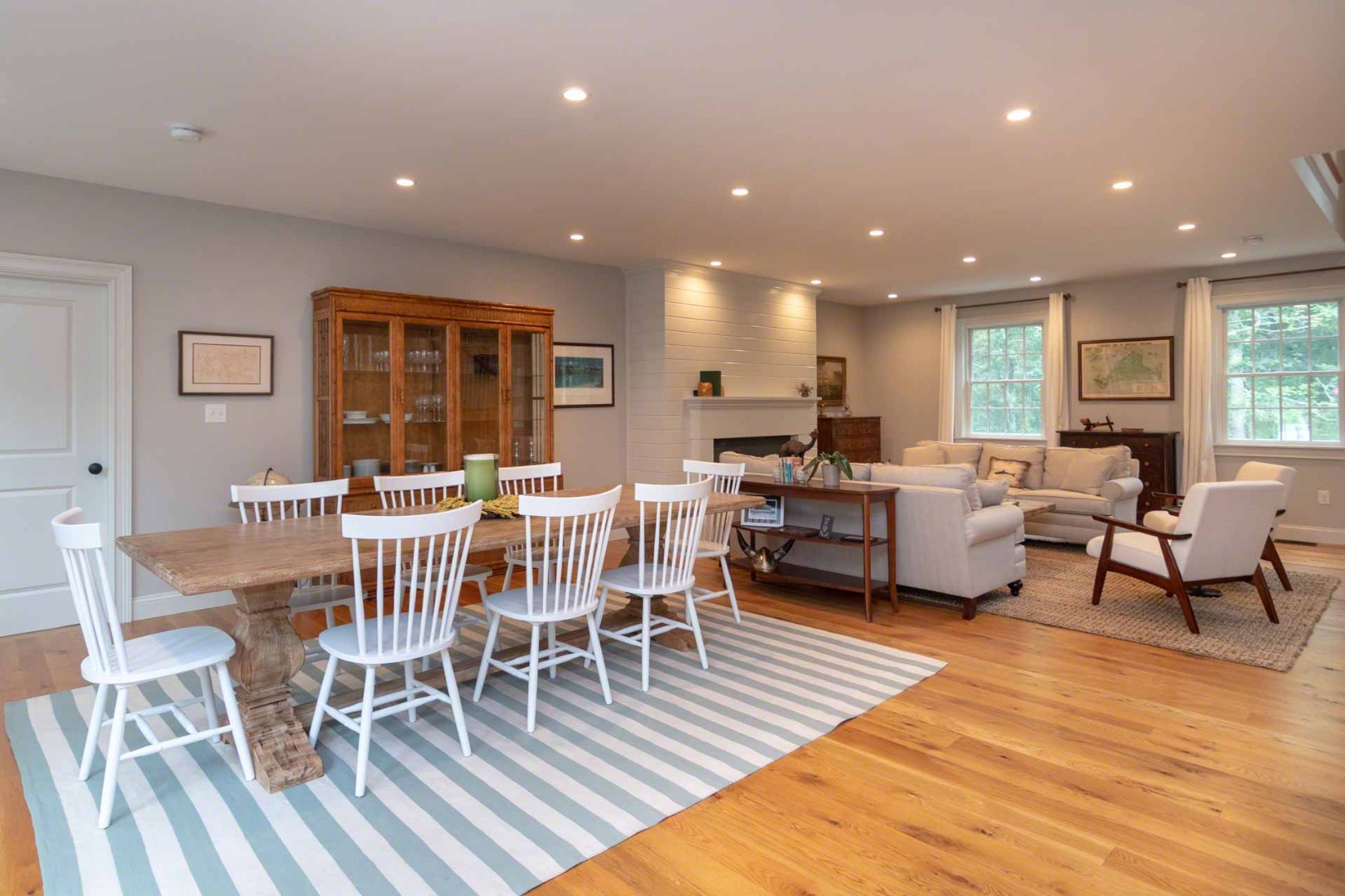 14 North Bog Road Edgartown, MA 02539 - Photo 10 of 46 a view of a dining room with furniture a rug and wooden floor
