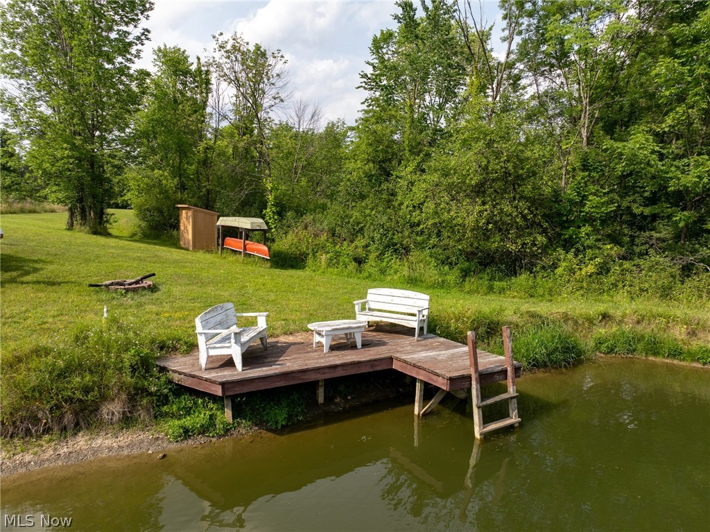 Bennett Road North Royalton, OH 44133 - Photo 19 of 26 Private pond with a wooden dock and ladder
