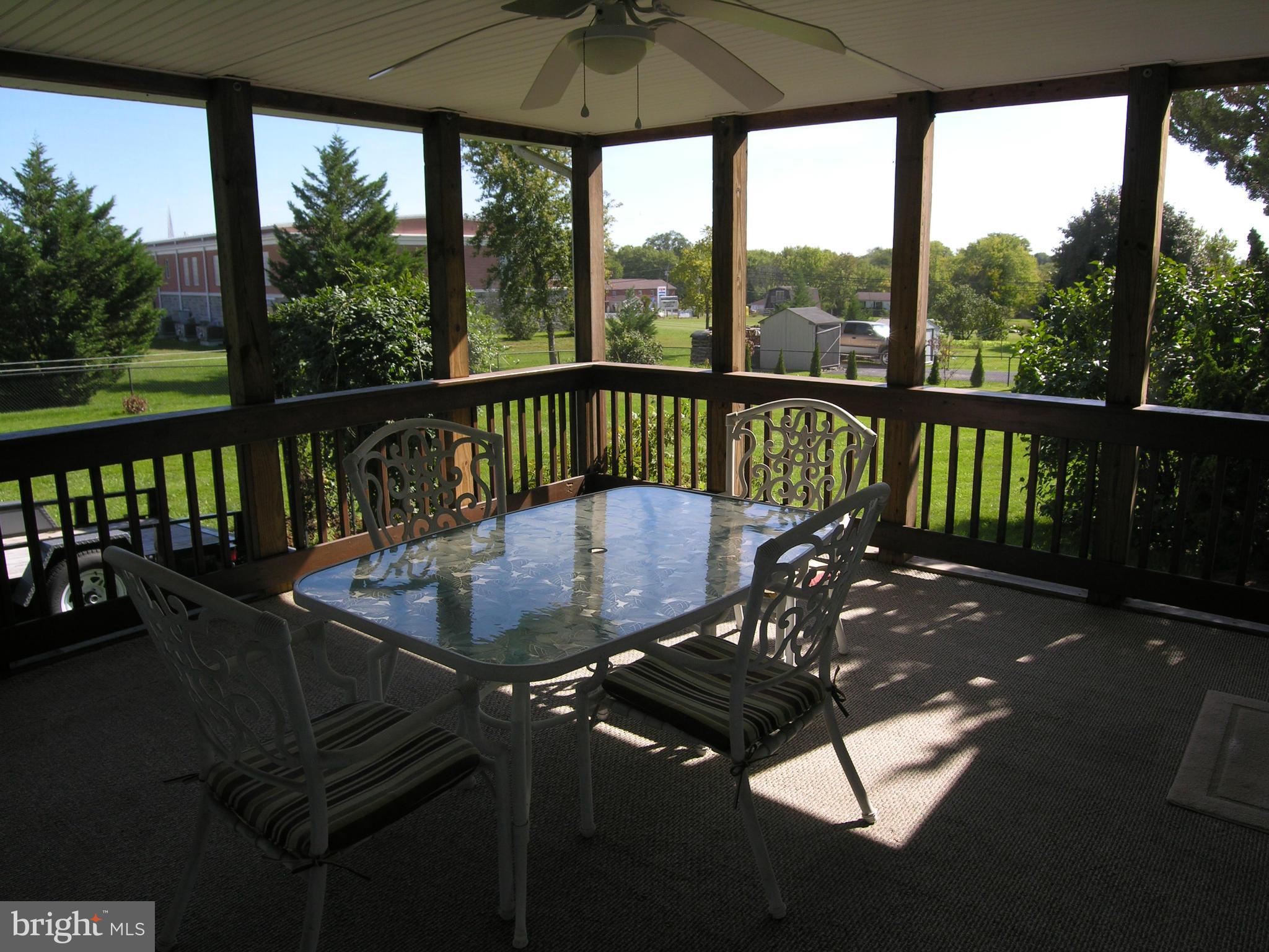 216 Poorhouse Road Winchester, VA 22603 - Photo 24 of 30 screened rear porch