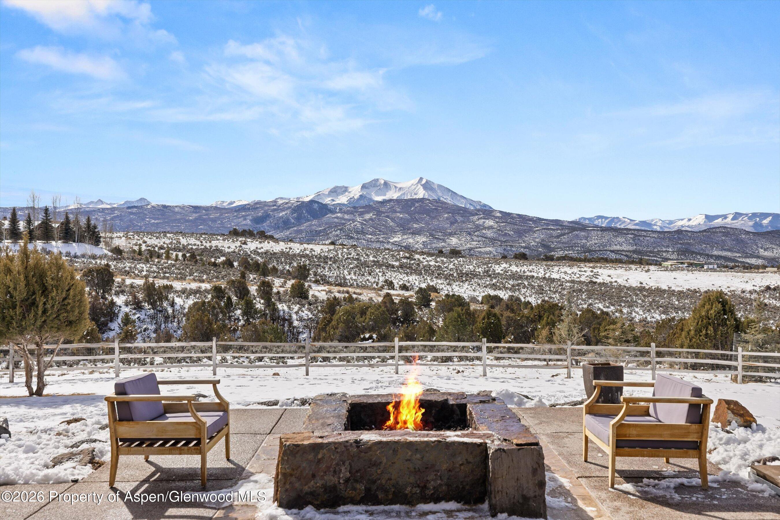 31 Wind River Road Carbondale, CO 81623 - Photo 1 of 46 a view of a lake with couches and city view