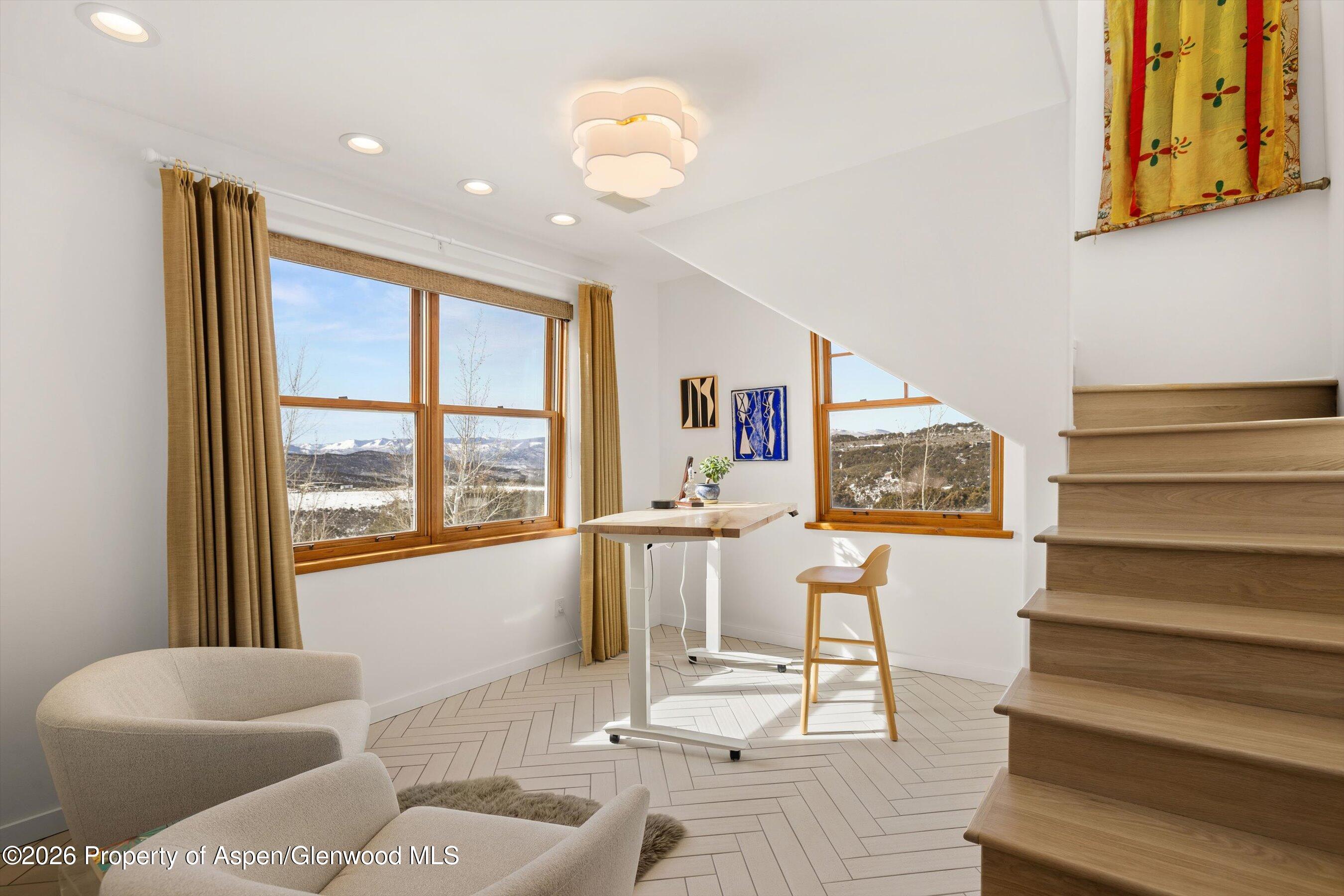 31 Wind River Road Carbondale, CO 81623 - Photo 28 of 46 a living room with furniture and a large window