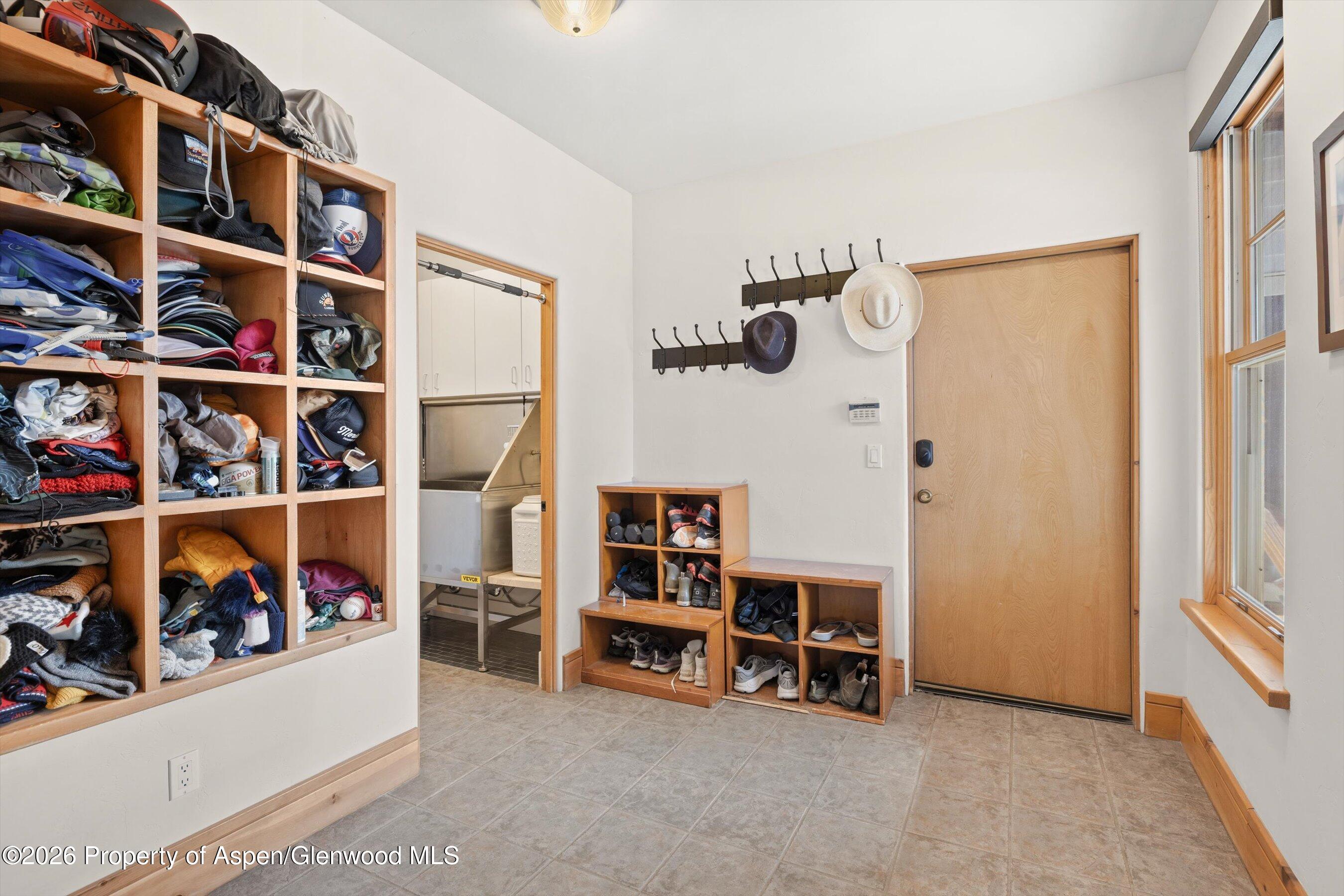 31 Wind River Road Carbondale, CO 81623 - Photo 40 of 46 a view of walk in closet with clothes and shoes