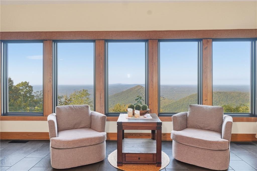 49 Rimrock Road Jasper, GA 30143 - Photo 12 of 61 a living room with furniture and a large window