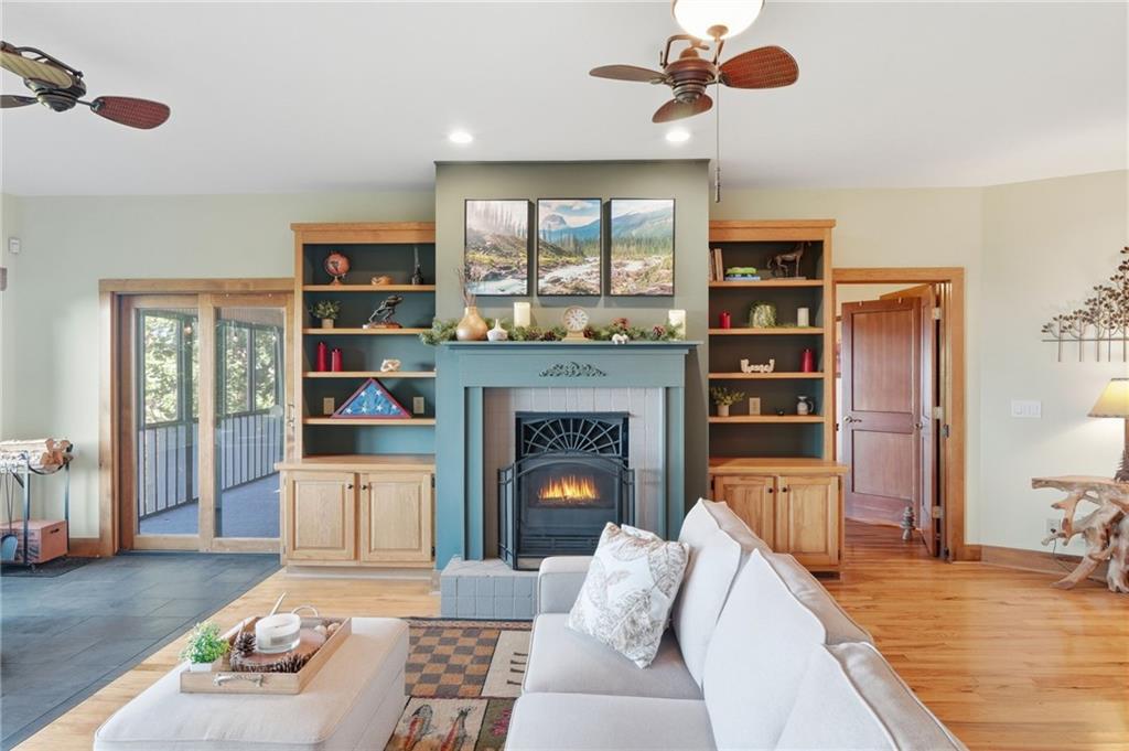 49 Rimrock Road Jasper, GA 30143 - Photo 13 of 61 a living room with furniture and a fireplace