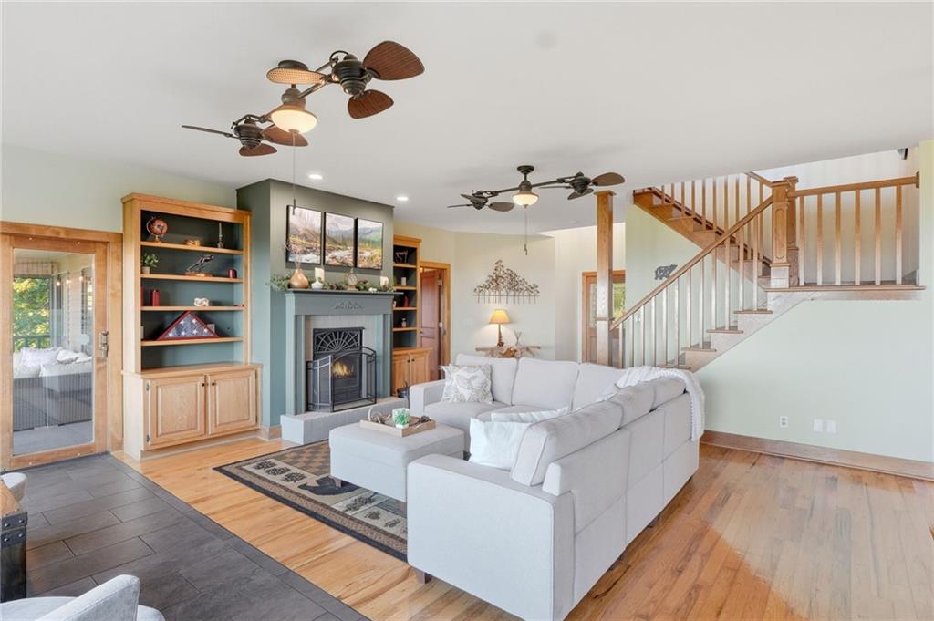 49 Rimrock Road Jasper, GA 30143 - Photo 14 of 61 a living room with furniture fireplace and flat screen tv