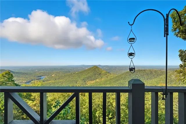 a view of a balcony with an ocean view
