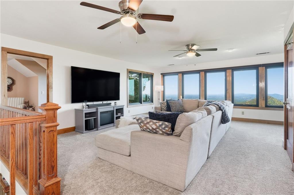 49 Rimrock Road Jasper, GA 30143 - Photo 31 of 61 a living room with furniture and a flat screen tv