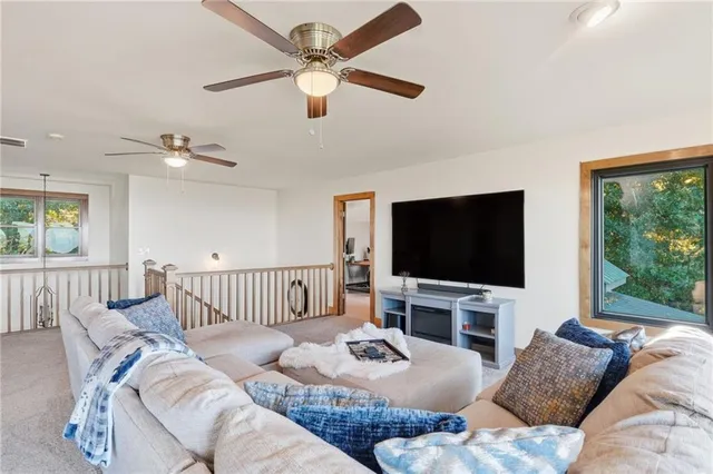 a bedroom with furniture and a window