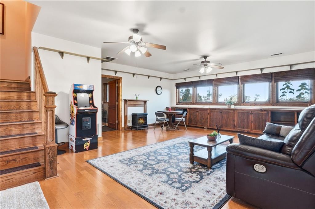 49 Rimrock Road Jasper, GA 30143 - Photo 39 of 61 a living room with fireplace furniture and a wooden floor