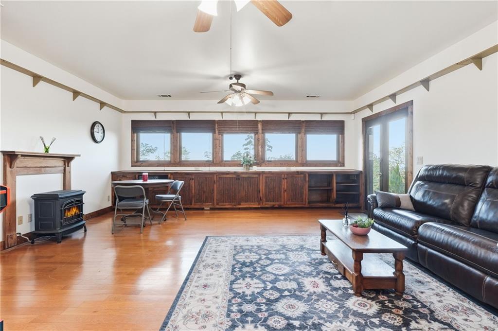 49 Rimrock Road Jasper, GA 30143 - Photo 40 of 61 a living room with furniture and a wooden floor