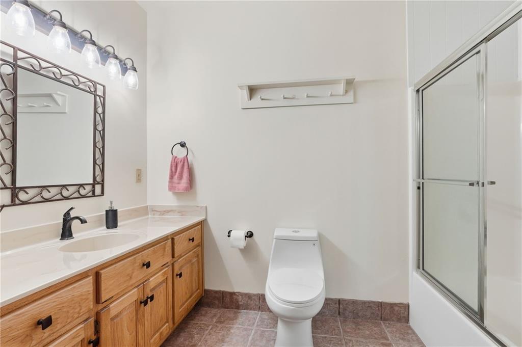 49 Rimrock Road Jasper, GA 30143 - Photo 44 of 61 a bathroom with a sink toilet and shower