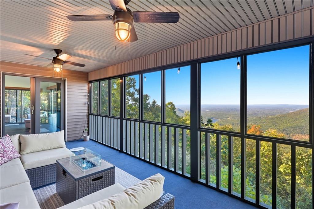 49 Rimrock Road Jasper, GA 30143 - Photo 9 of 61 a living room with furniture and a floor to ceiling window