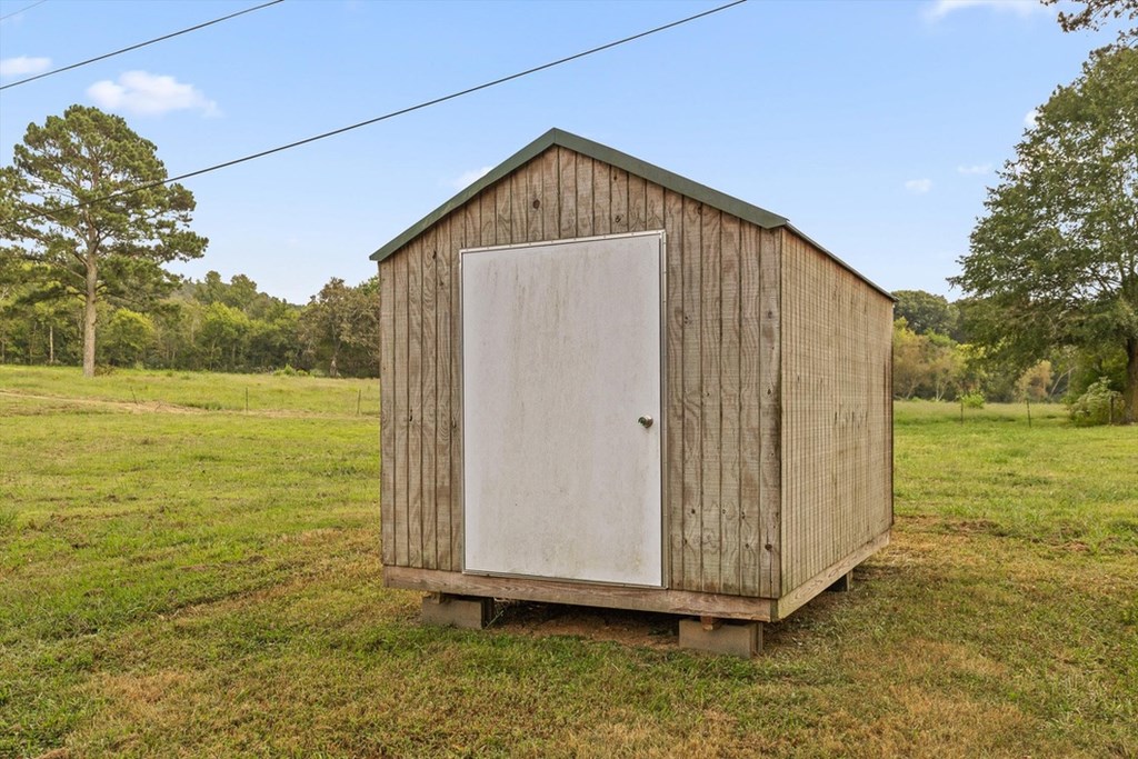 446 Brown Bridge Road Chatsworth, GA 30705 - Photo 35 of 77 a house view with a outdoor space