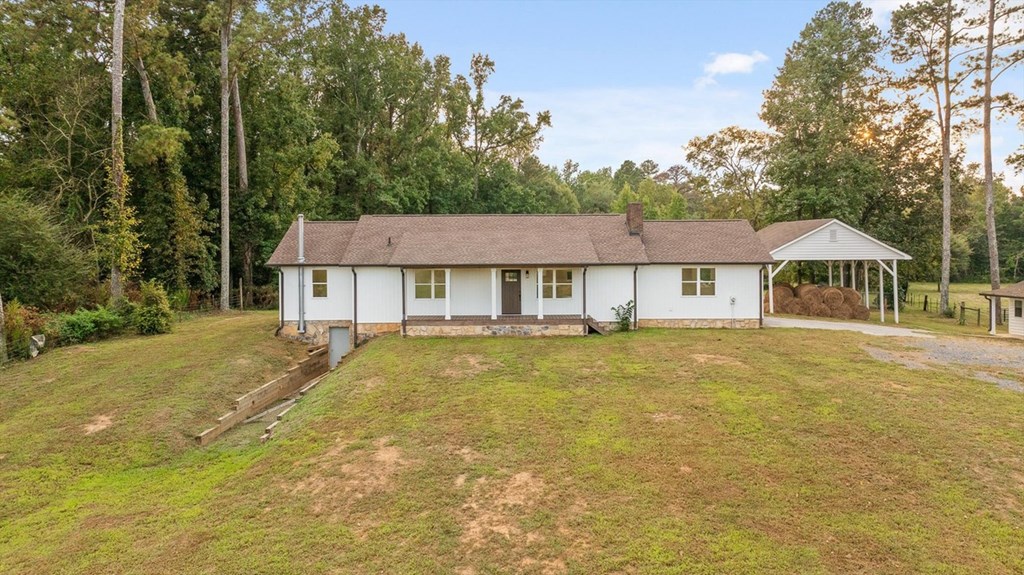 446 Brown Bridge Road Chatsworth, GA 30705 - Photo 37 of 77 a front view of a house with swimming pool