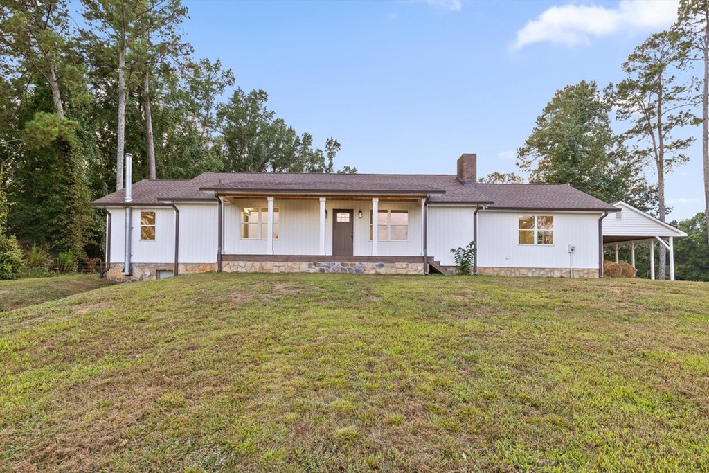446 Brown Bridge Road Chatsworth, GA 30705 - Photo 43 of 77 a front view of a house with a garden
