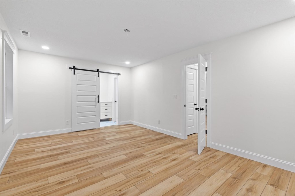 446 Brown Bridge Road Chatsworth, GA 30705 - Photo 66 of 77 a view of an empty room with closet and a bathroom