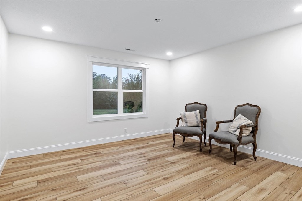 446 Brown Bridge Road Chatsworth, GA 30705 - Photo 68 of 77 a living room with furniture and two window