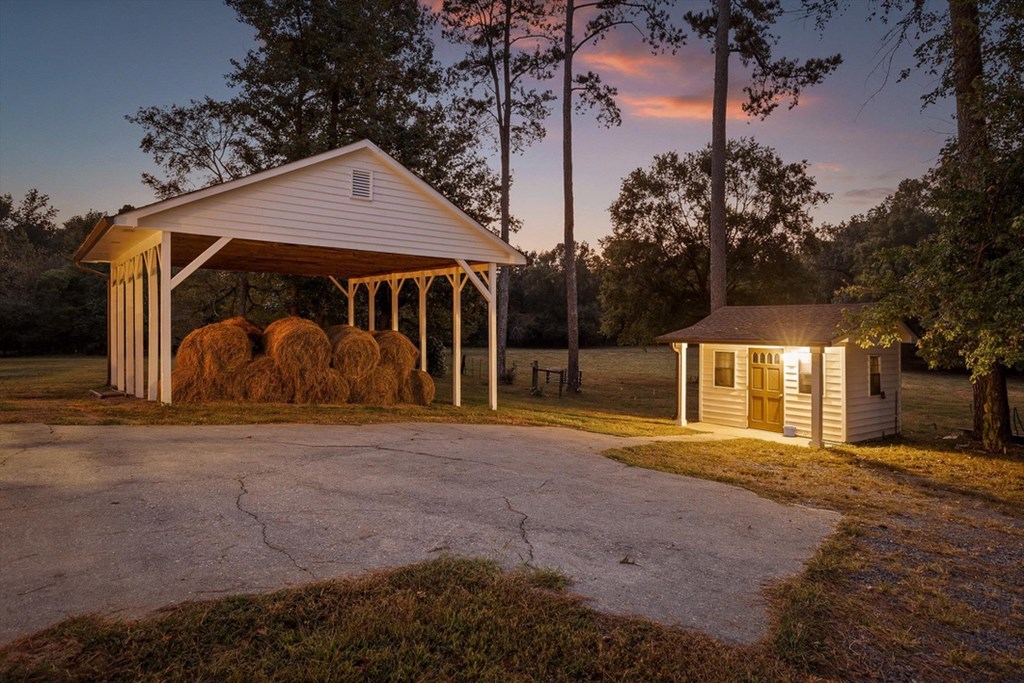 446 Brown Bridge Road Chatsworth, GA 30705 - Photo 75 of 77 a front view of a house with a yard and garage