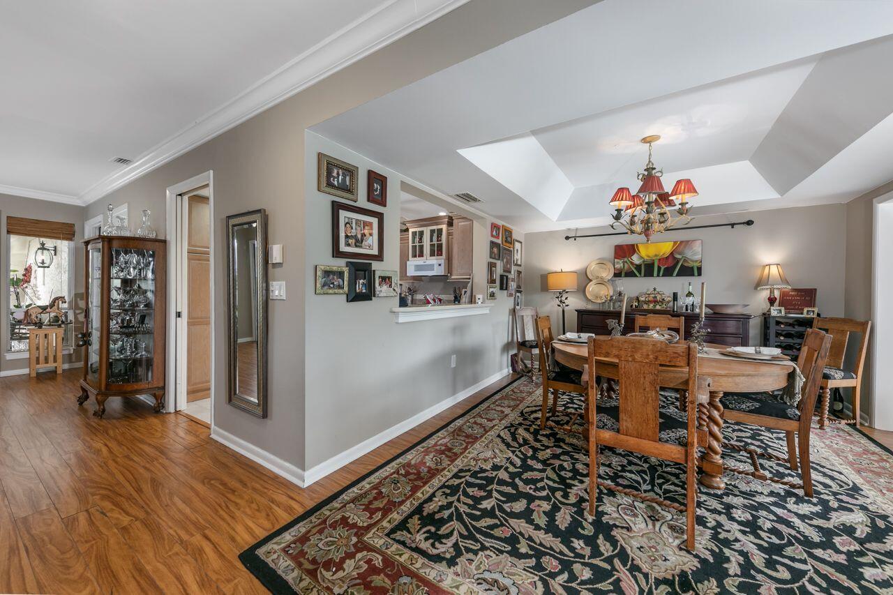 5606 Southeast Foxcross Place Stuart, FL 34997 - Photo 12 of 65 a view of a dining room with furniture