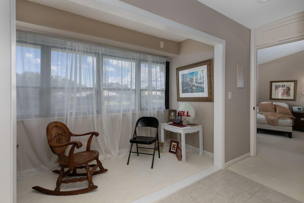 5606 Southeast Foxcross Place Stuart, FL 34997 - Photo 23 of 65 a view of a workspace with furniture and a window