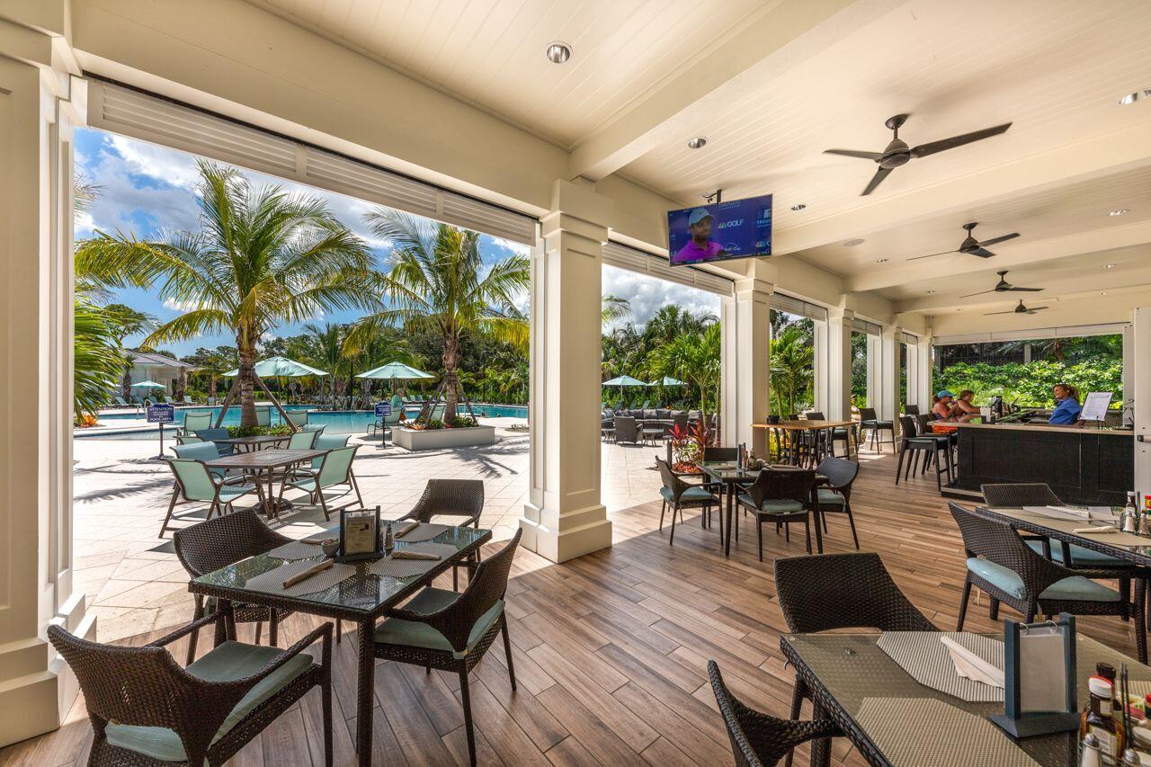 5606 Southeast Foxcross Place Stuart, FL 34997 - Photo 54 of 65 a view of a dining room with furniture window and outside view