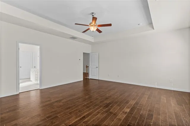a bathroom with double sink and a mirror
