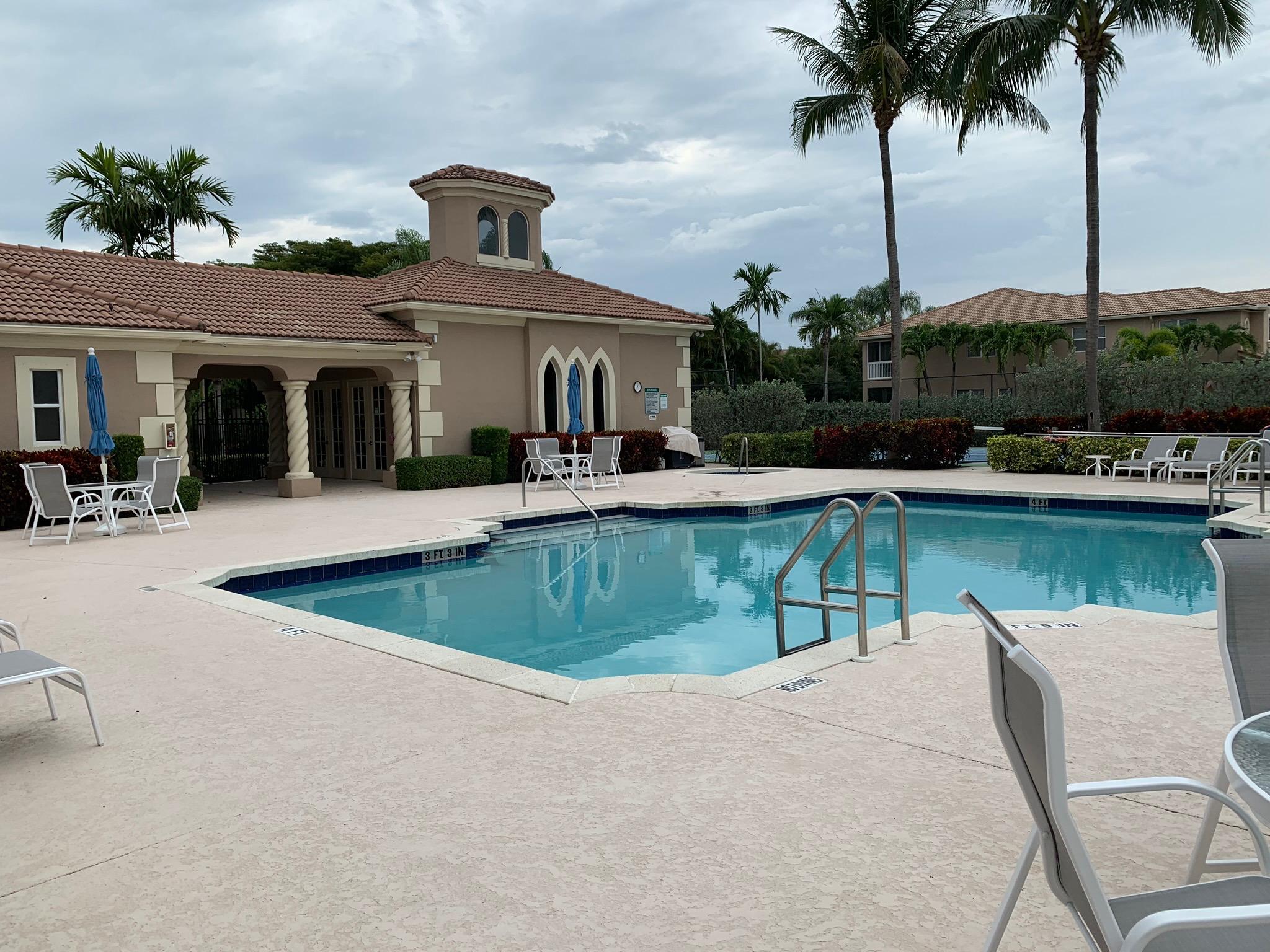 16055 Sims Road, Unit C101 Delray Beach, FL 33484 - Photo 43 of 46 Pool and clubhouse