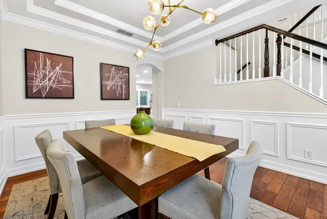 a kitchen with stainless steel appliances granite countertop a refrigerator sink and cabinets
