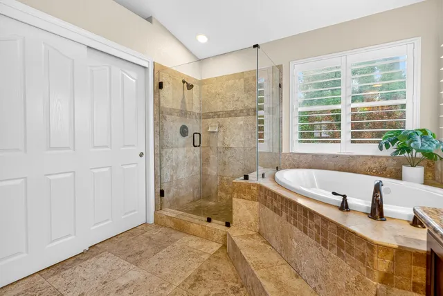 a outdoor dining space with furniture and garden view