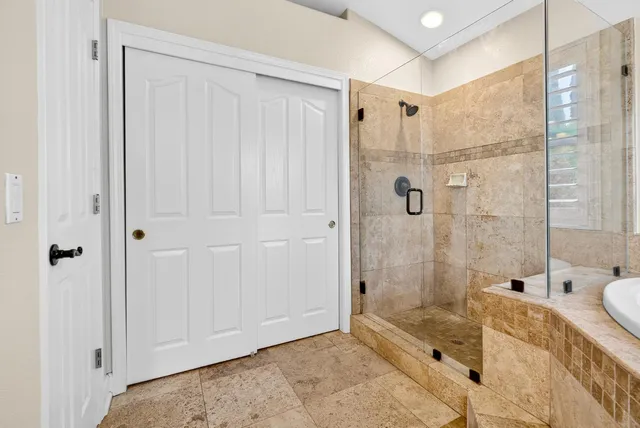 a outdoor space with patio couch and a potted plant