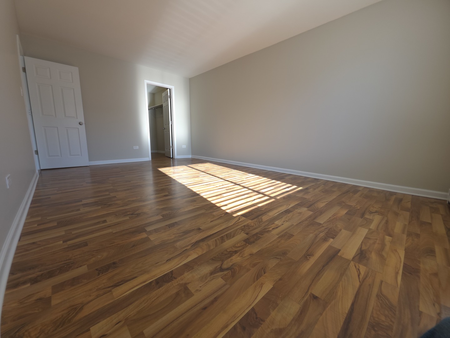 412 East Bailey Road, Unit 104 Naperville, IL 60565 - Photo 8 of 11 a view of empty room with wooden floor