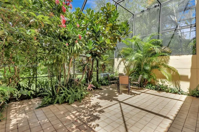 a view of a pathway with a yard