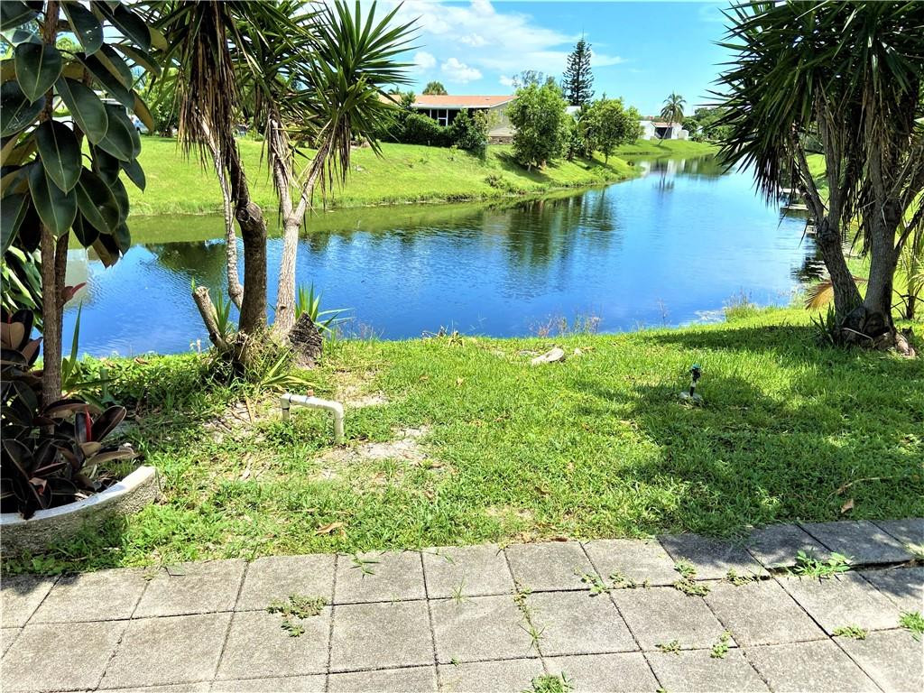 1490 Southwest 65th Way Boca Raton, FL 33428 - Photo 15 of 17 Back Patio with Water View