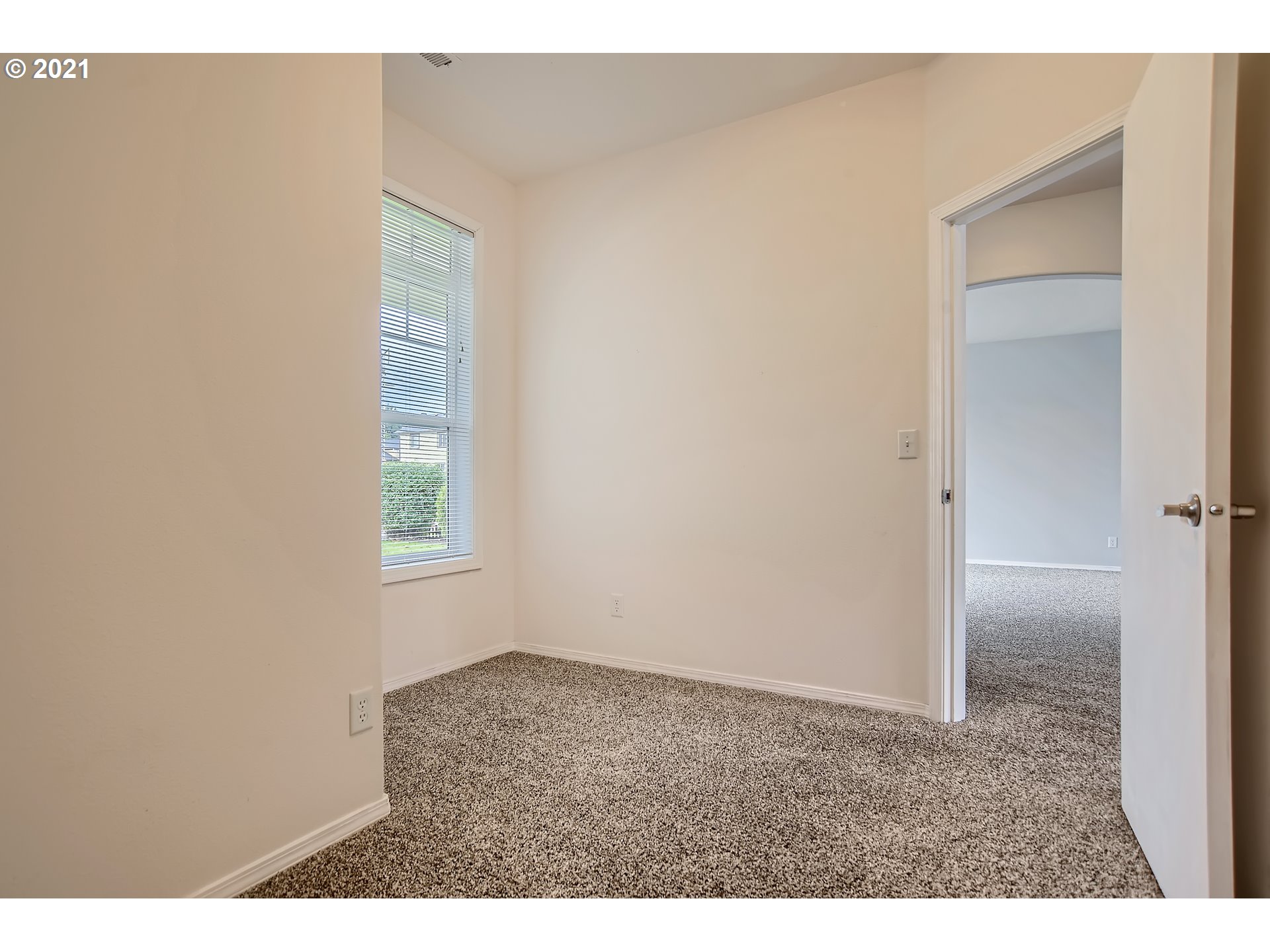 14540 Southeast Marci Way Clackamas, OR 97015 - Photo 16 of 32 an empty room with windows and closet